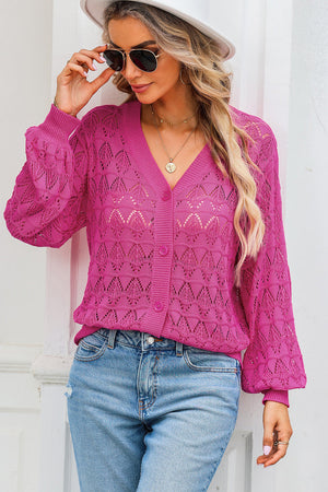 Deep Rose openwork knit cardigan with balloon sleeves and button front.