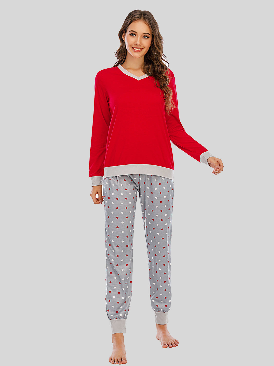 Red long sleeve lounge set with grey trim and polka dot pants