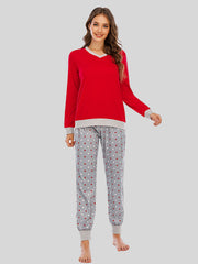 Red long sleeve lounge set with grey trim and polka dot pants