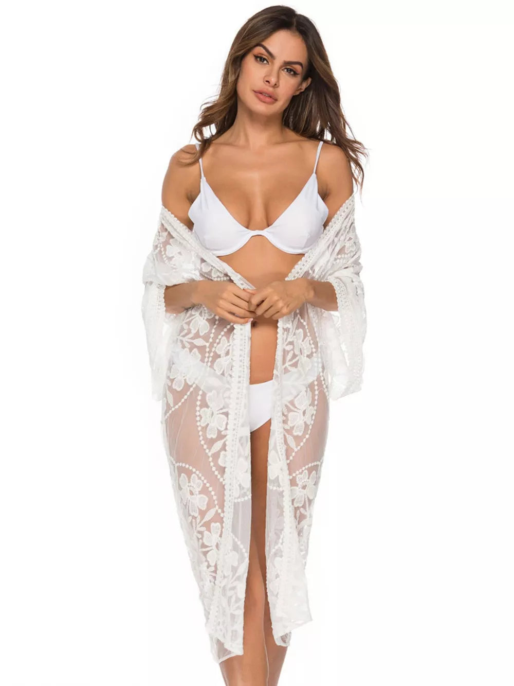 White floral lace kimono cover-up with open front and wide sleeves.