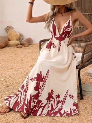 Maxi dress with deep V-neck, floral print, and a-line cut.