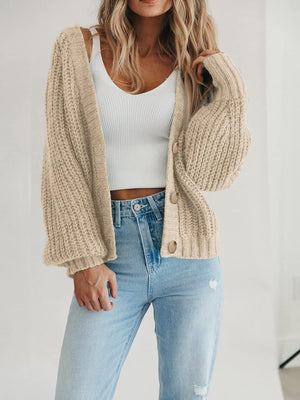 Camel knit cardigan with voluminous sleeves and button front.