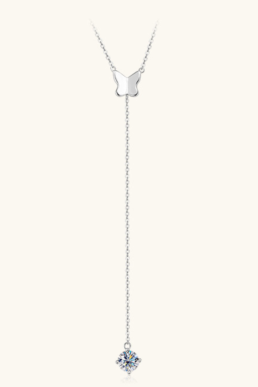 Silver lariat necklace with butterfly pendant and moissanite drop