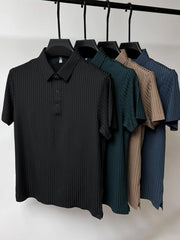 Textured ribbed polo shirt in black with buttoned placket and short sleeves.