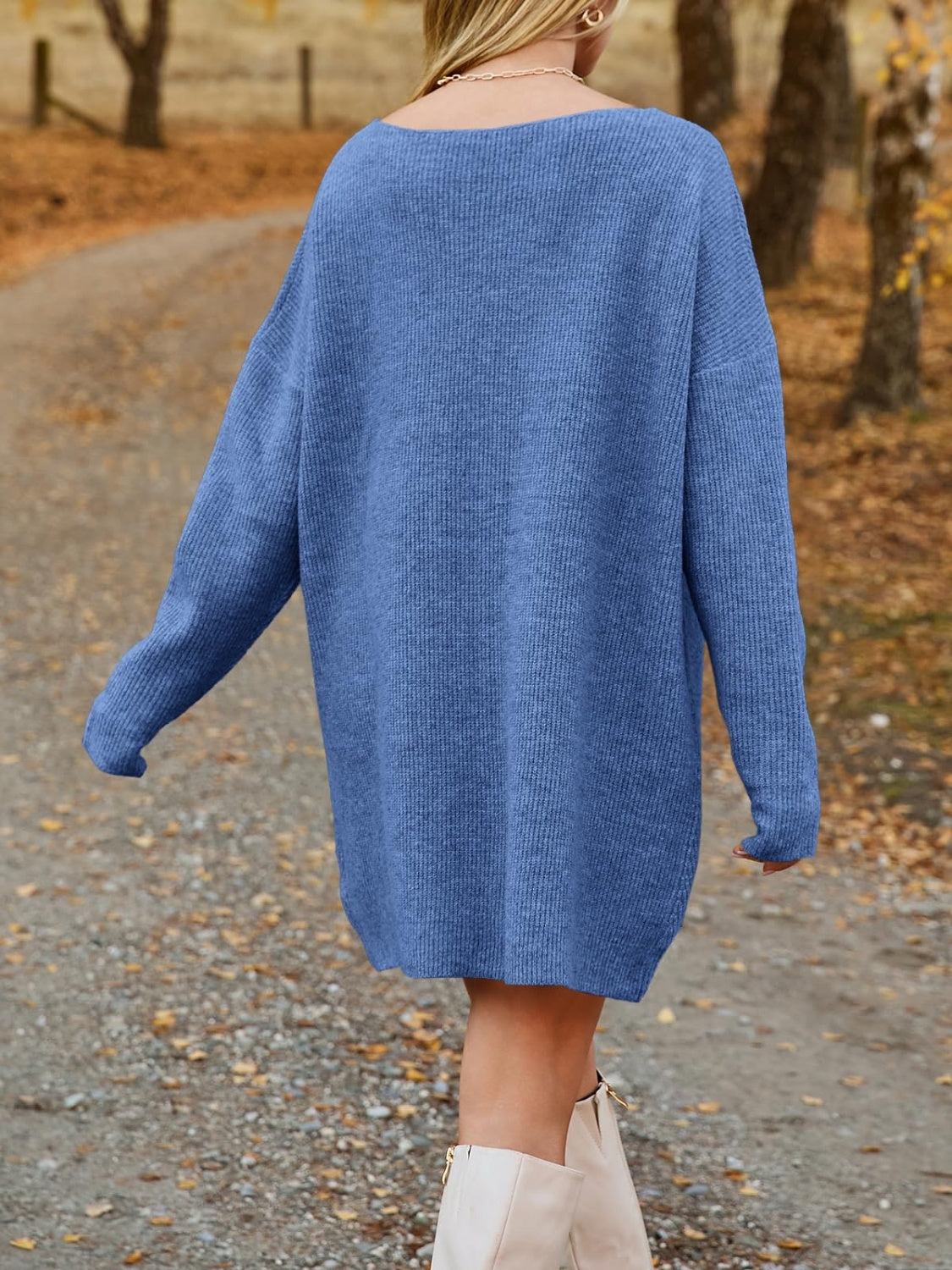 Blue ribbed knit oversized mini dress with long sleeves and a boat neck.