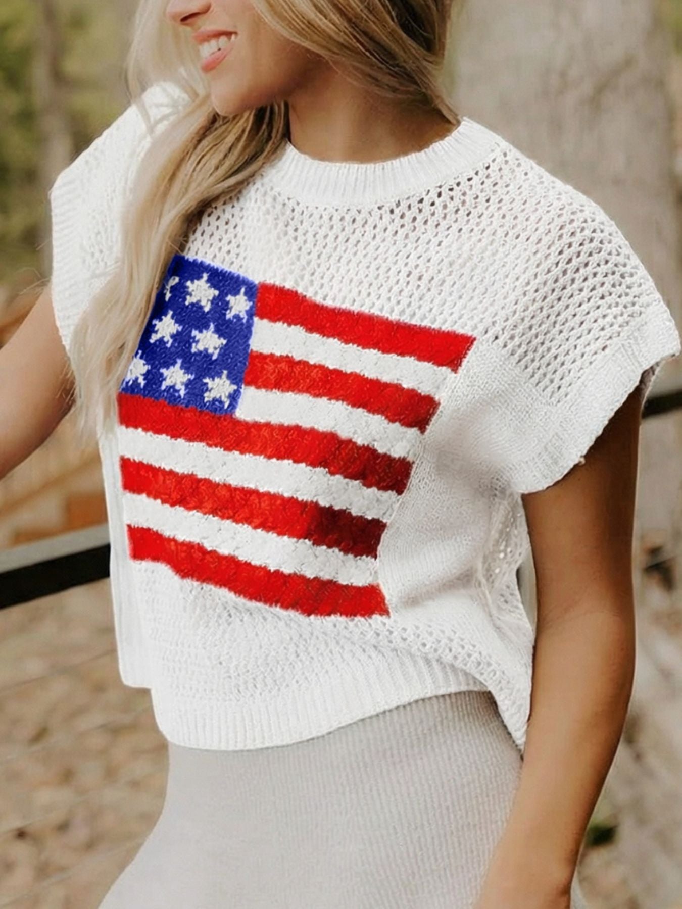 White knit short sleeve top with American flag graphic, mesh detail, crew neck