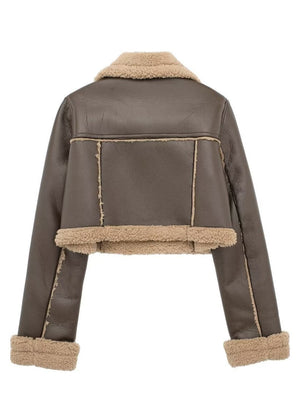 Brown cropped aviator jacket with shearling trim and collar detail.