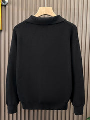 Black knitted sweater with classic collar and ribbed details