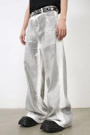 Metallic panel wide leg trousers in light with white side stripes and a brushed texture.