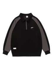 Black raglan quarter zip sweatshirt with contrast gray sleeves and embroidered logo