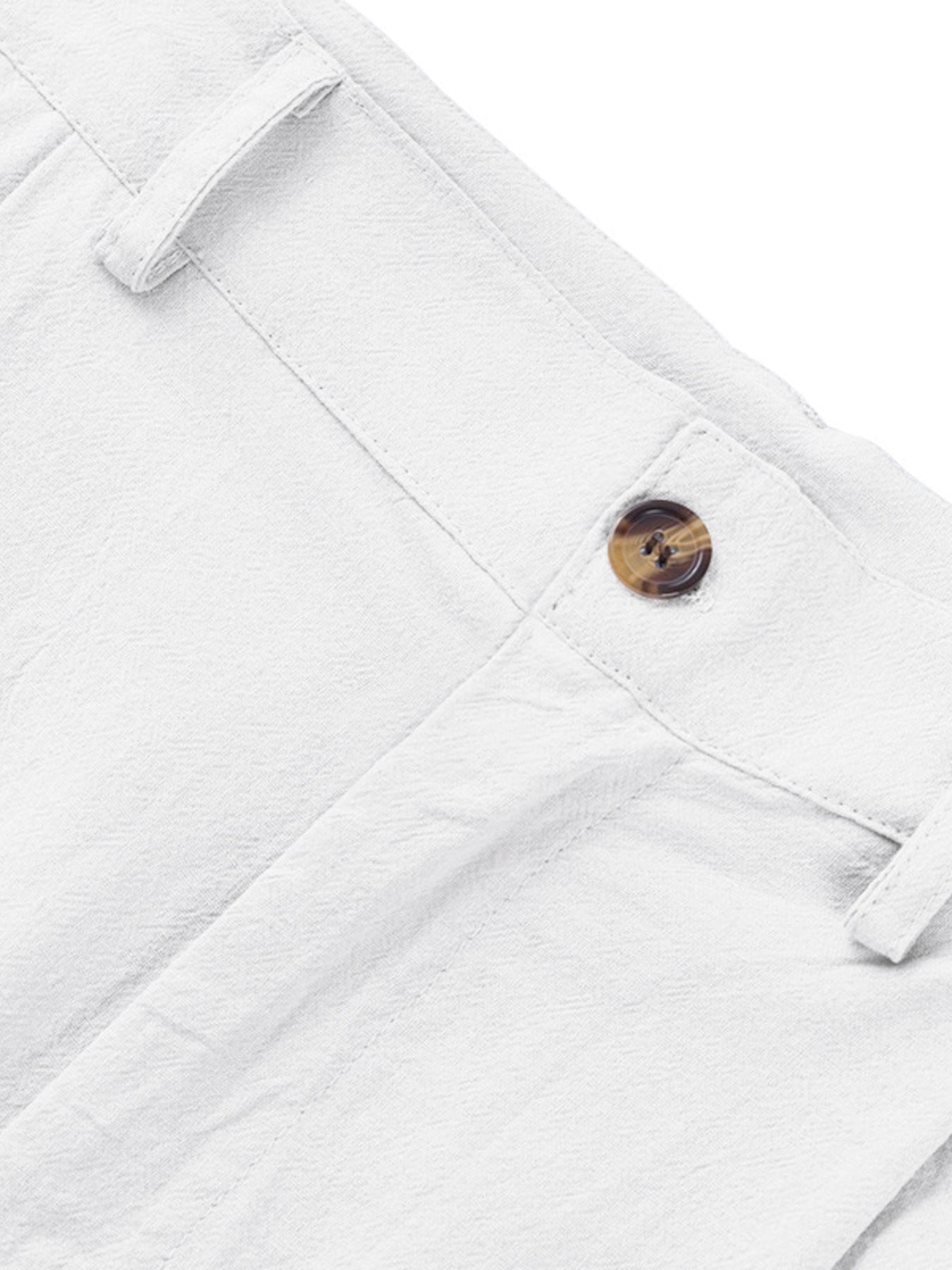 White relaxed fit sweatpants with button closure and textured fabric detail.
