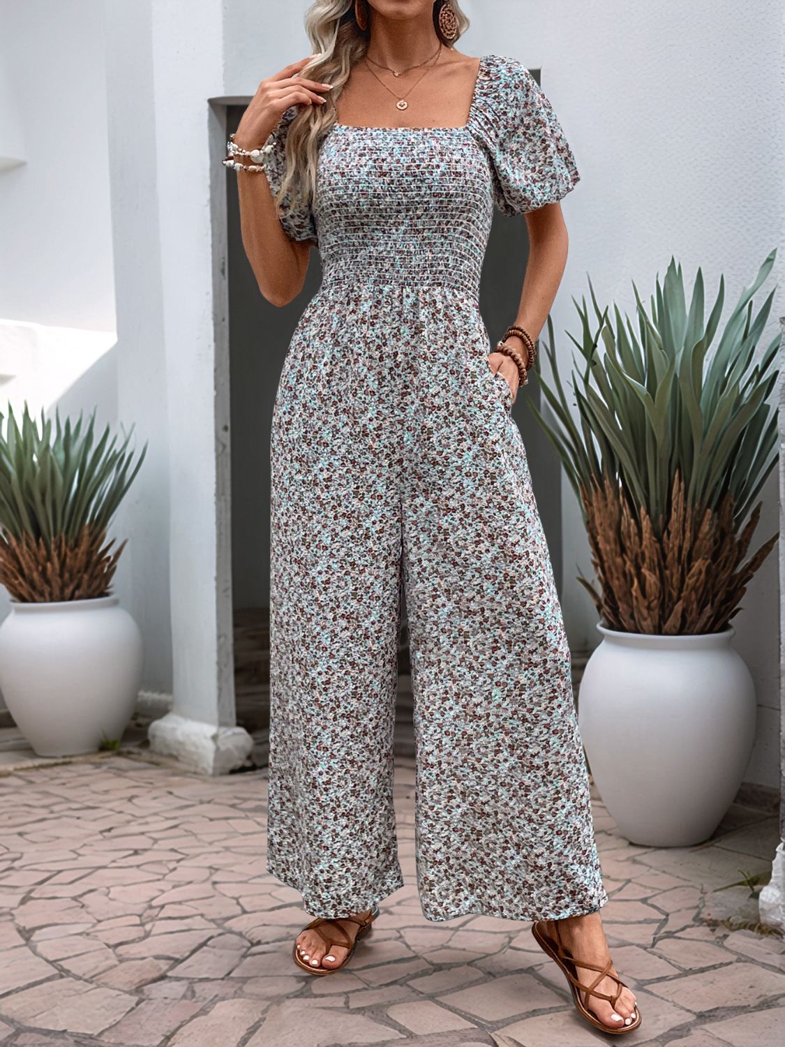 Floral smocked bodice wide leg jumpsuit in Dusty Pink with puff sleeves and square neckline.