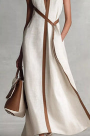 Belted midi dress in white with elegant brown contrast trim and tie waist.