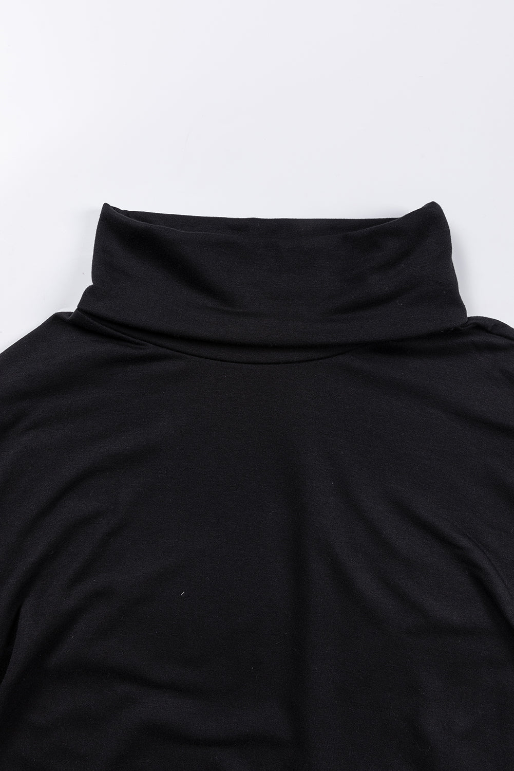 Black cowl neck tunic with draped front detail.