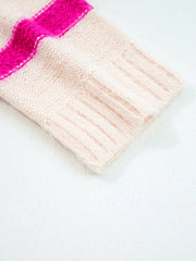 Pink acrylic knit sweater with bold fuchsia stripes and ribbed cuff detail.