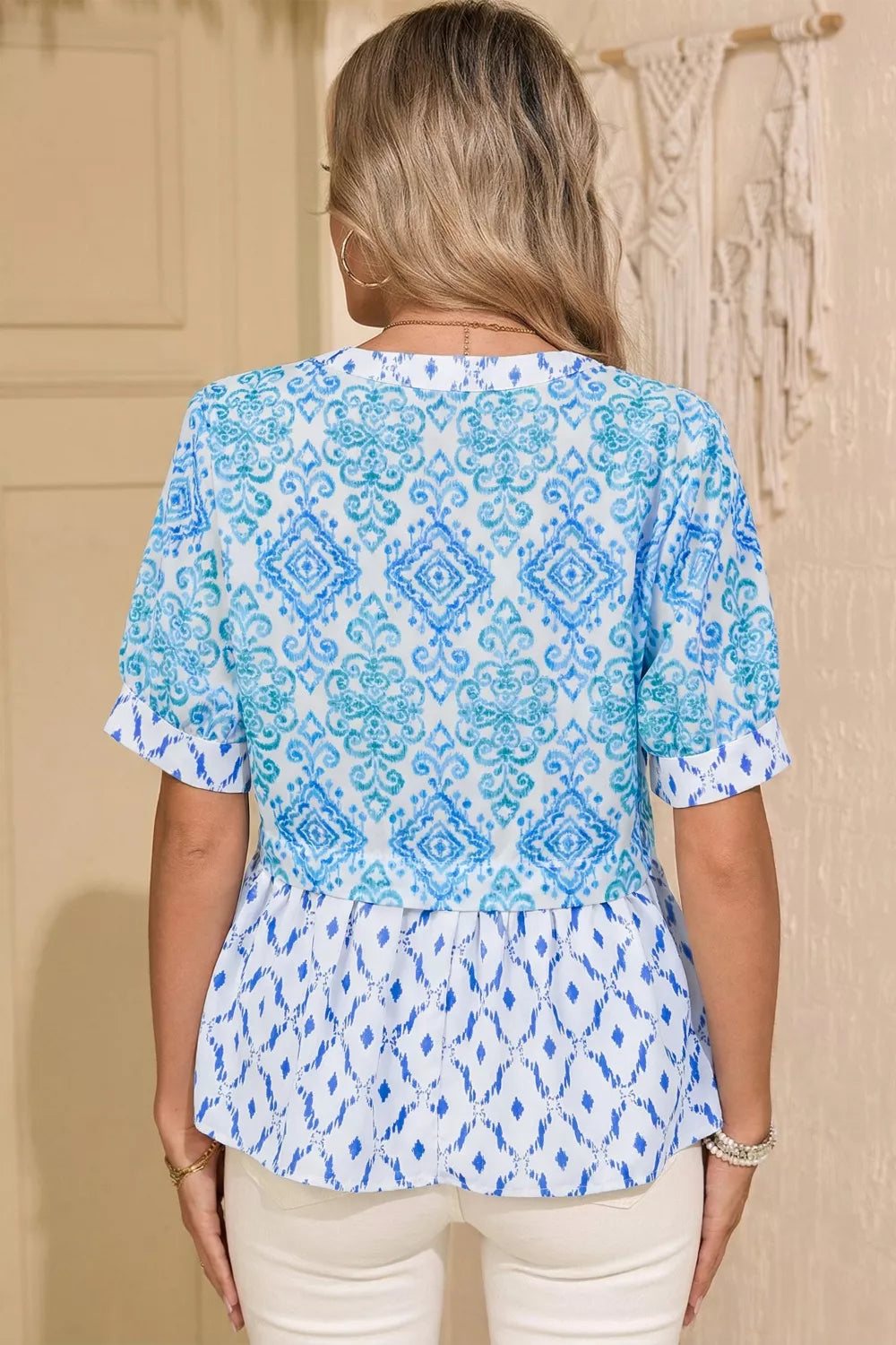 Patchwork babydoll maternity overshirt with puff sleeves in blue and white ikat print.