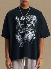 Black oversized graphic tee with gothic print and crew neck.