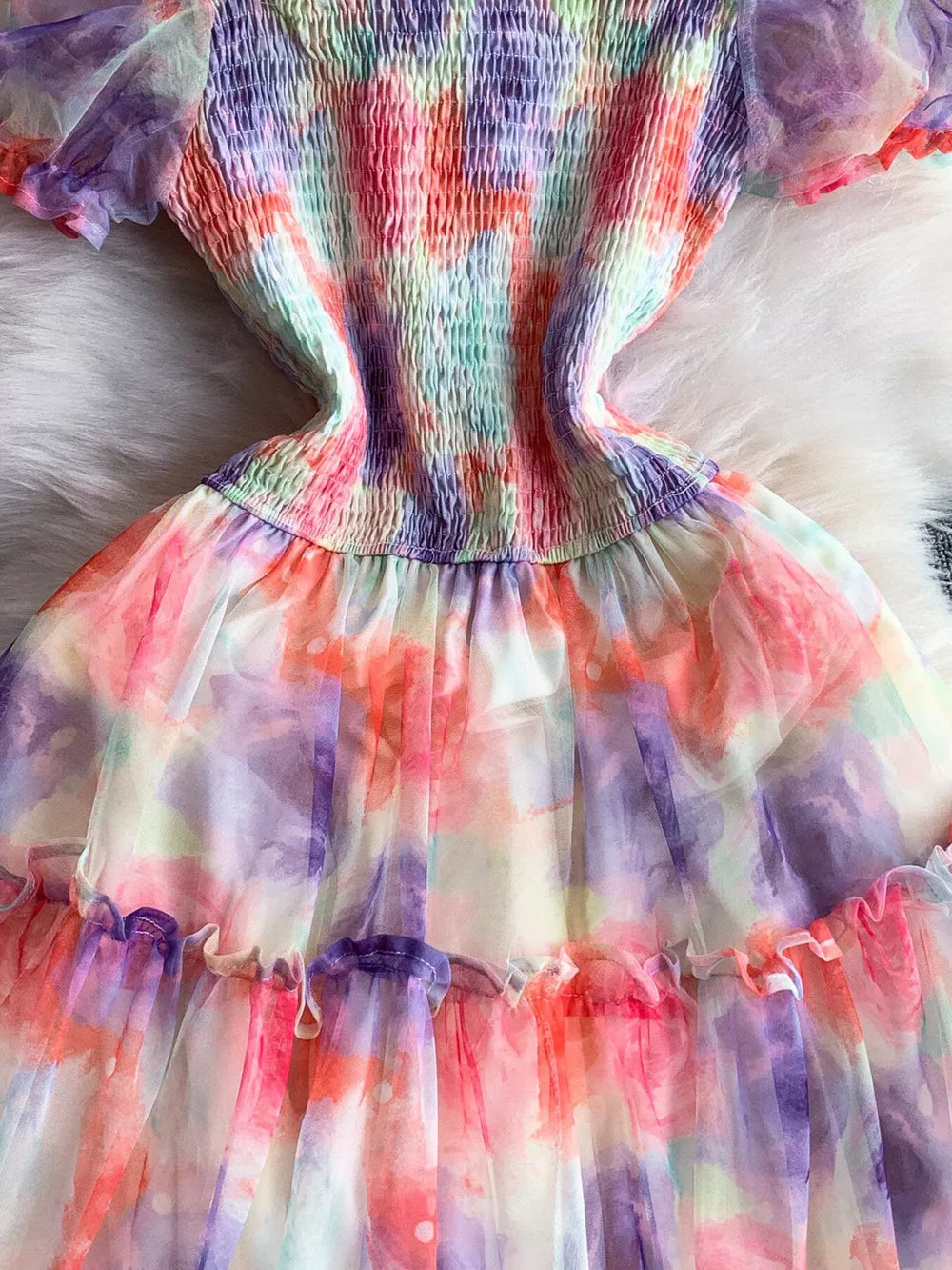 Floral tiered midi dress with smocked bodice in a sherbet tie-dye print.