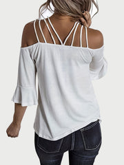 White cold shoulder blouson with strappy detail and flared sleeves
