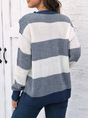 Cozy knit sweater with color block stripes in dark blue and white acrylic.
