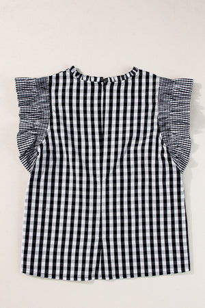 Black gingham blouse with mock neck and ruffled cap sleeves.