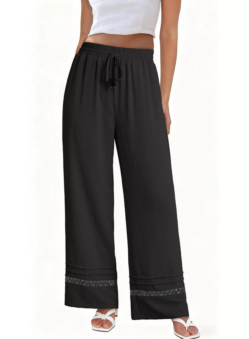 Black wide-leg maternity pants with drawstring and decorative hem detail