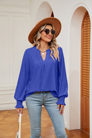 Royal blue eyelet detail blouse with poet sleeves and v-neck