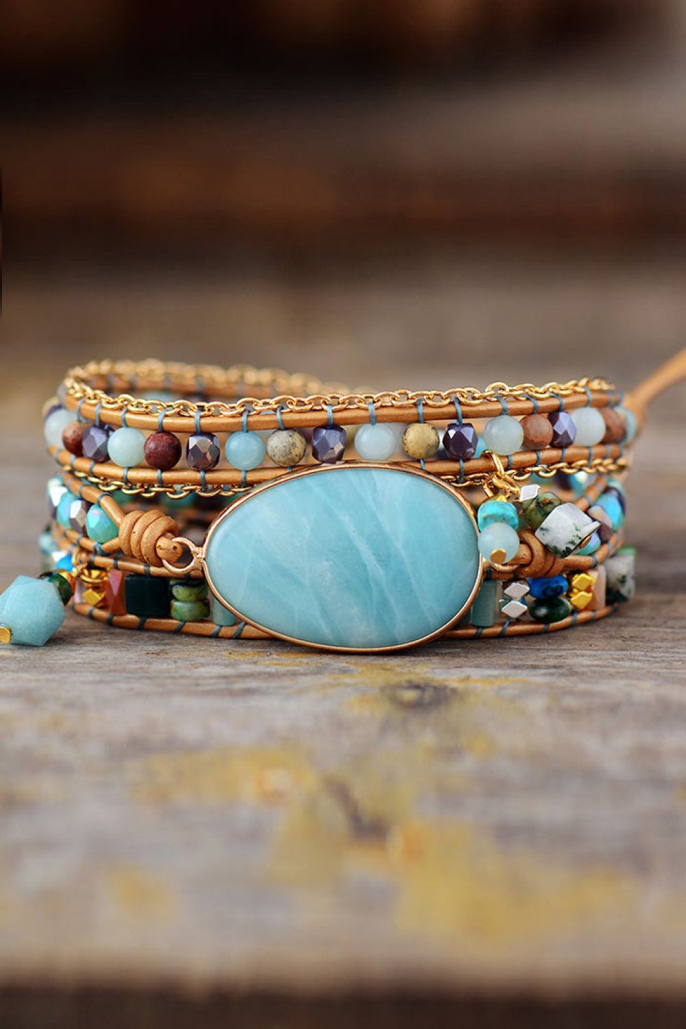 Amazonite and beaded wrap bracelet with leather and gold chain details.