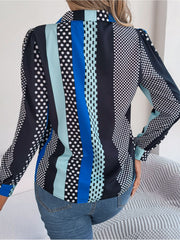 Panelled print collared blouse with polka dots and stripes in black, white, and blue.