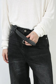 Oversized black wash denim jeans with a casual, chic fit.