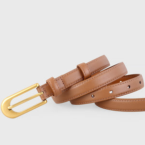 Matte buckle leather belt in coffee brown with gold buckle detail.