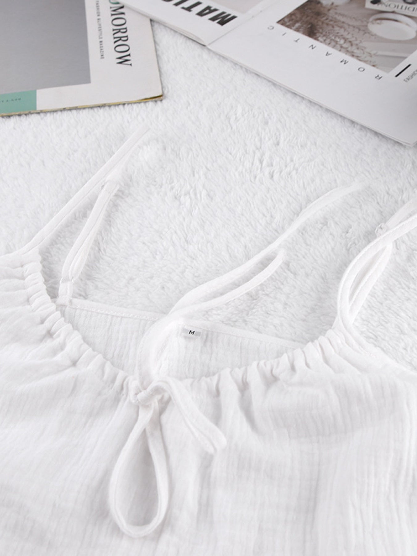 White cotton cami pajama top with adjustable tie neckline and thin straps