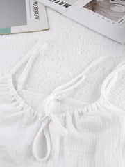 White cotton cami pajama top with adjustable tie neckline and thin straps