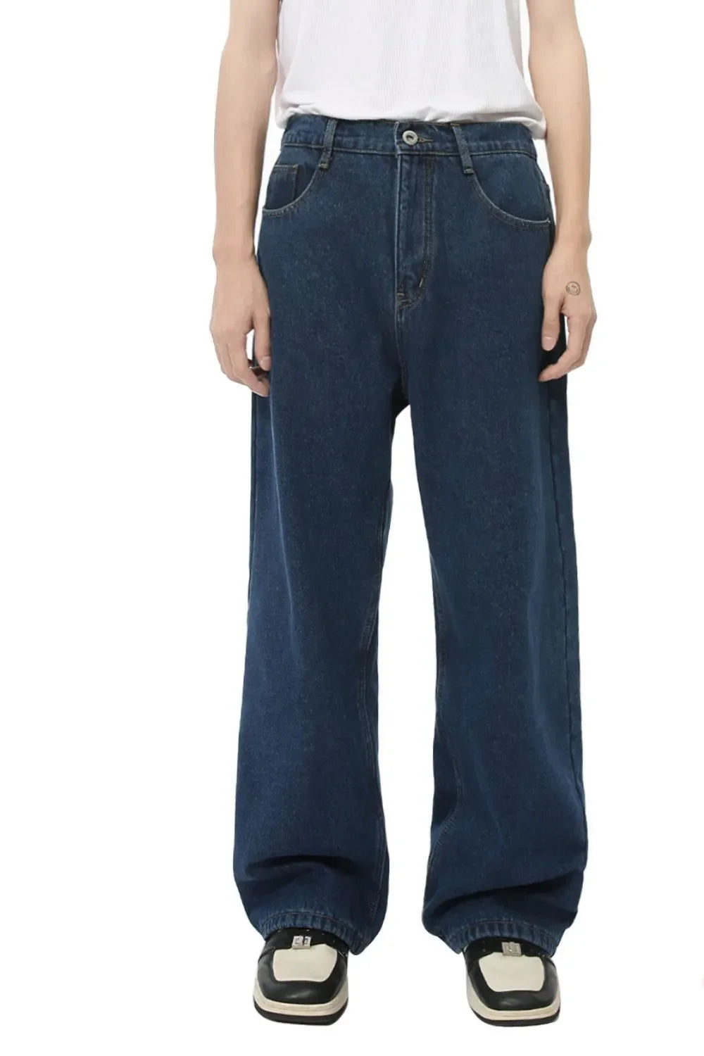 Dark wash denim jeans with a relaxed, wide-leg fit and baggy silhouette.