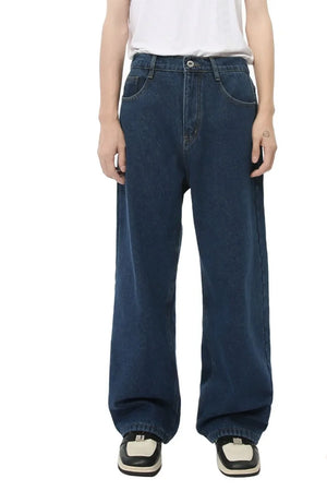 Dark wash denim jeans with a relaxed, wide-leg fit and baggy silhouette.