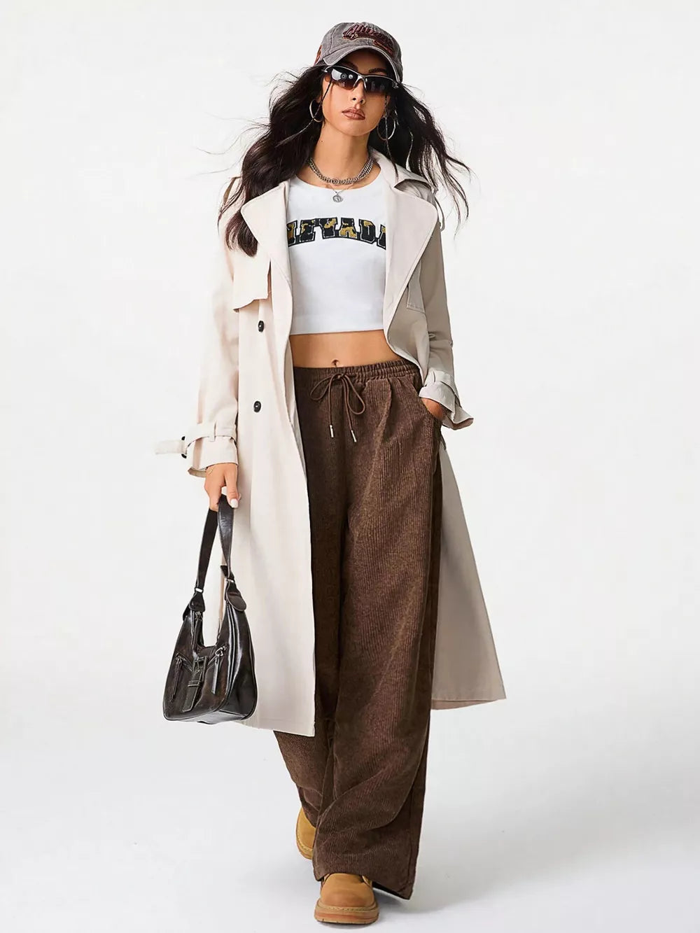Brown corduroy wide-leg maternity trousers with drawstring waist.