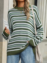 Oversized striped knit sweater in green and white with a mock neck and long sleeves.