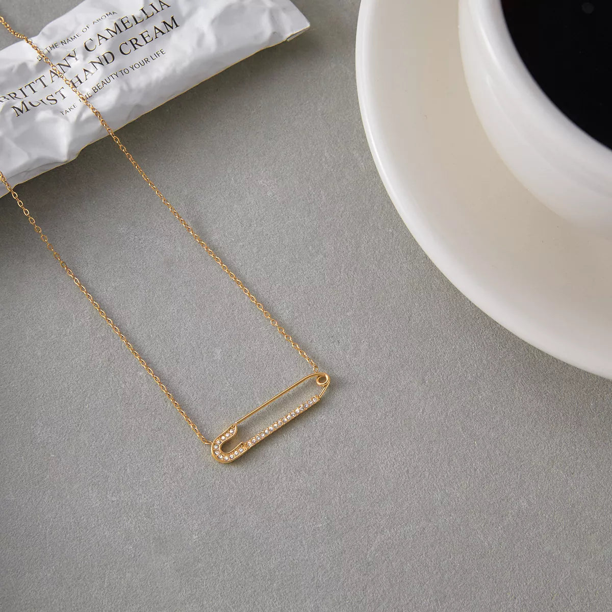 Gold paperclip layered necklace with pave crystals