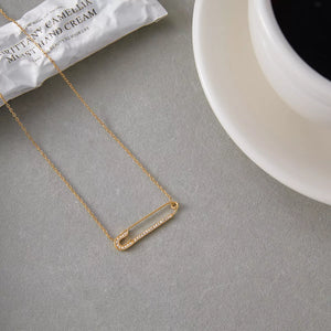 Gold paperclip layered necklace with pave crystals