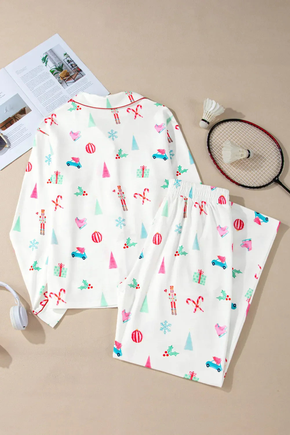 White festive print pajama set with piping and collar, featuring holiday icons.