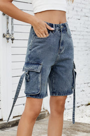 Medium blue denim cargo shorts with straps and large side pockets.