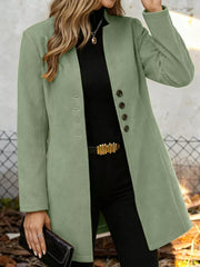 Chic longline trench coat in Matcha Green with button-down detail and collarless neckline.