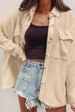 Textured corduroy overshirt in camel with patch pockets and button front.