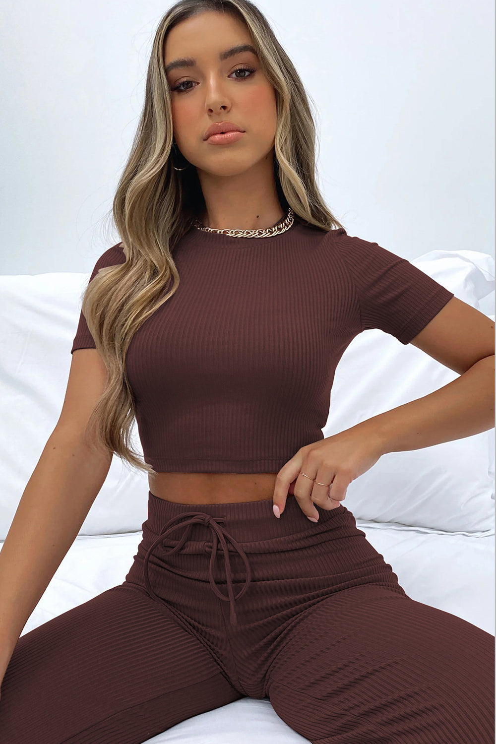 Ribbed crop top and wide leg pants set in camel, white, black, brown, or sage.
