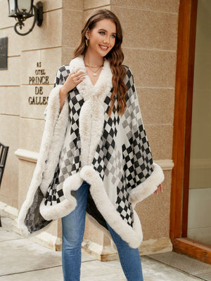 Diamond checkered poncho in charcoal with faux fur trim and collar.