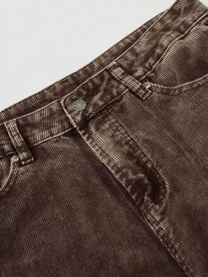 Brown corduroy joggers for men, featuring a button fly and classic pocket details.