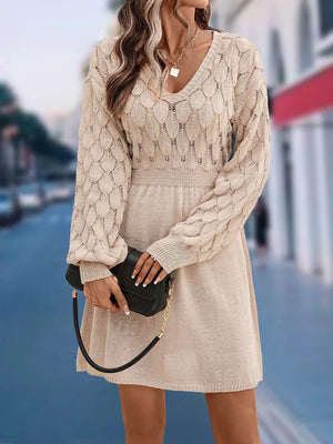 Tan openwork knit V-neck sweater dress with cinched waist and above knee length