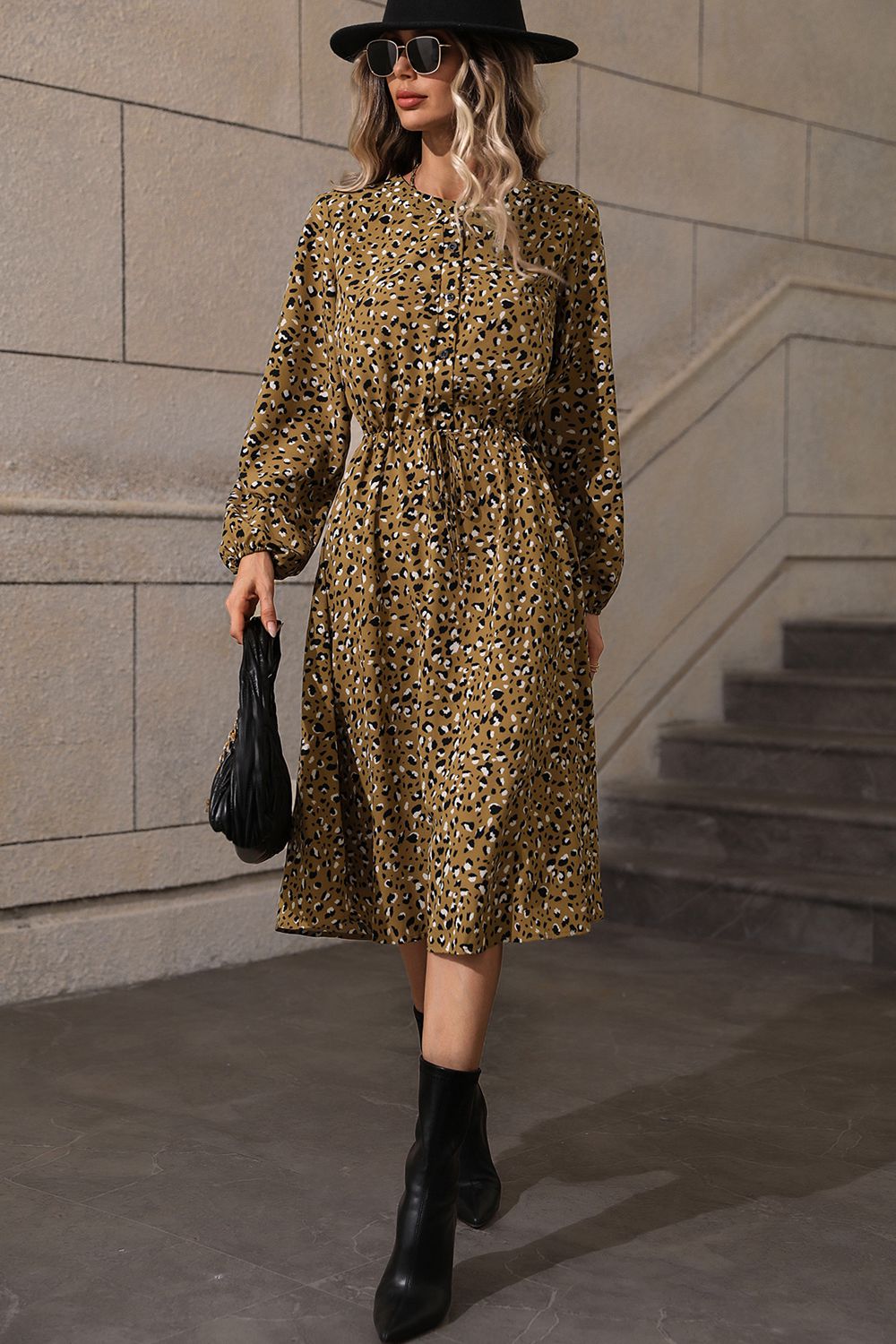 Olive animal print midi dress with gathered waist and button front, long sleeves.