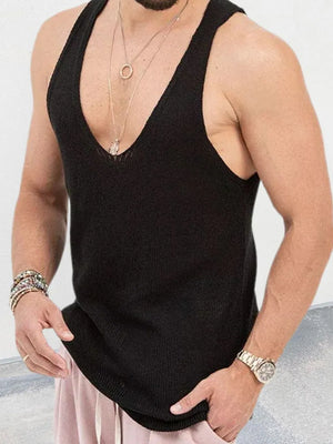 Black knit tank top with deep V-neck, acrylic material, worn by a man with necklaces and bracelets.