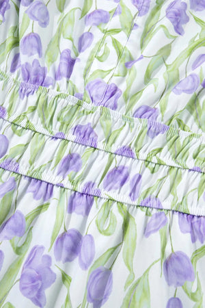 Lavender tulip print midi dress with smocked waist detail.